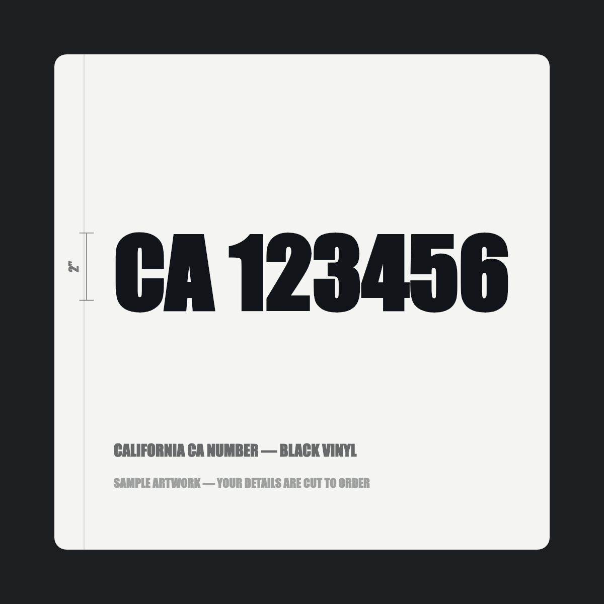California CA number — "CA 123456" cut in black vinyl on a white truck door panel