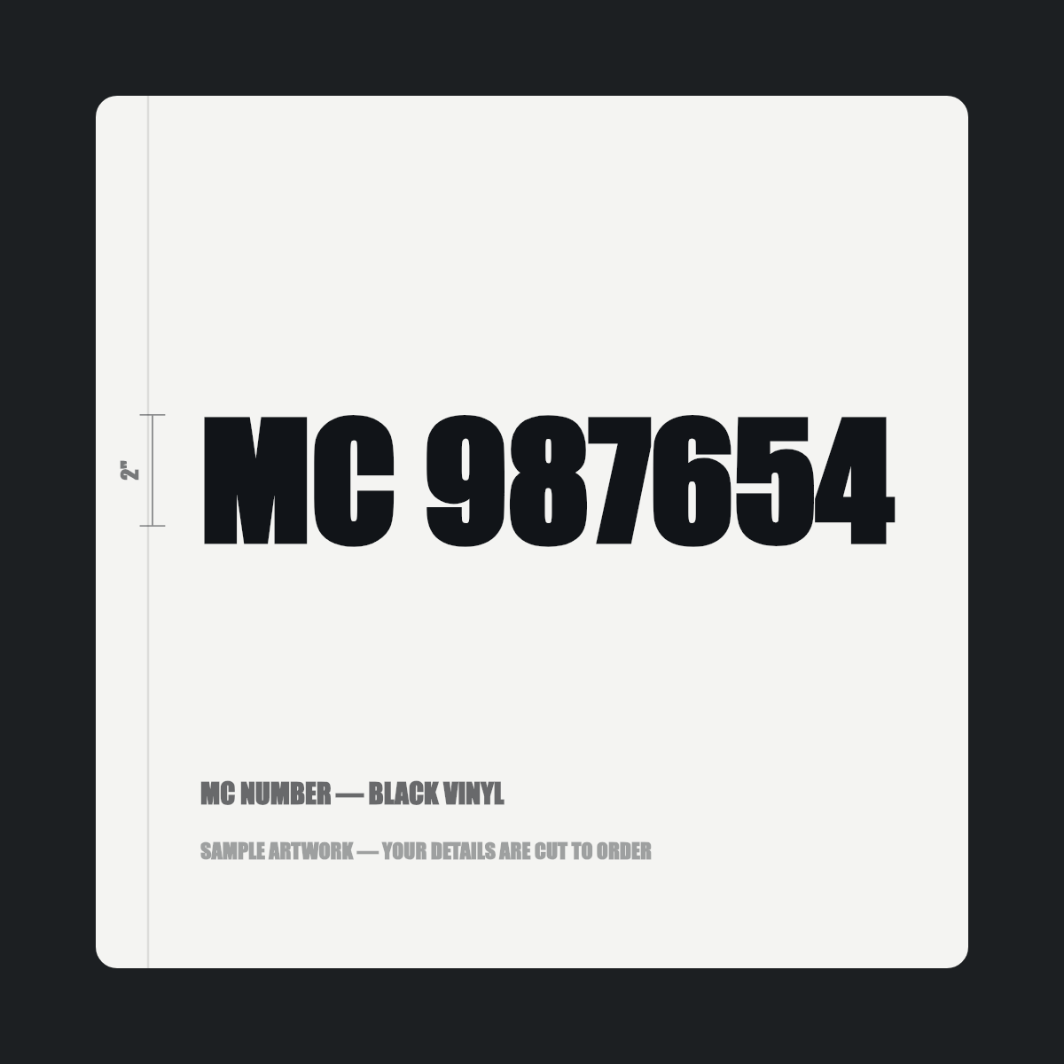 MC number — "MC 987654" cut in black vinyl on a white truck door panel