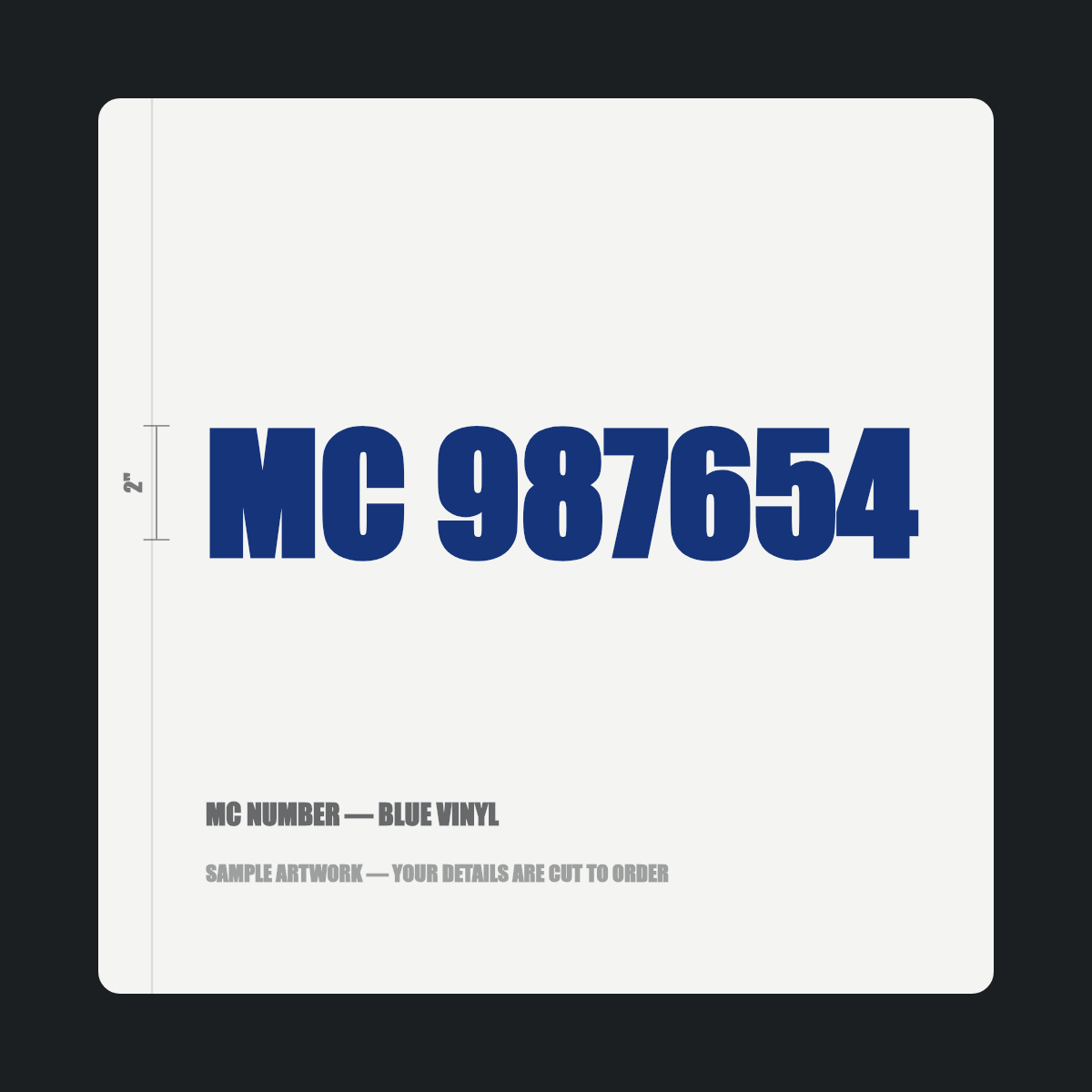 MC number — "MC 987654" cut in blue vinyl on a white truck door panel